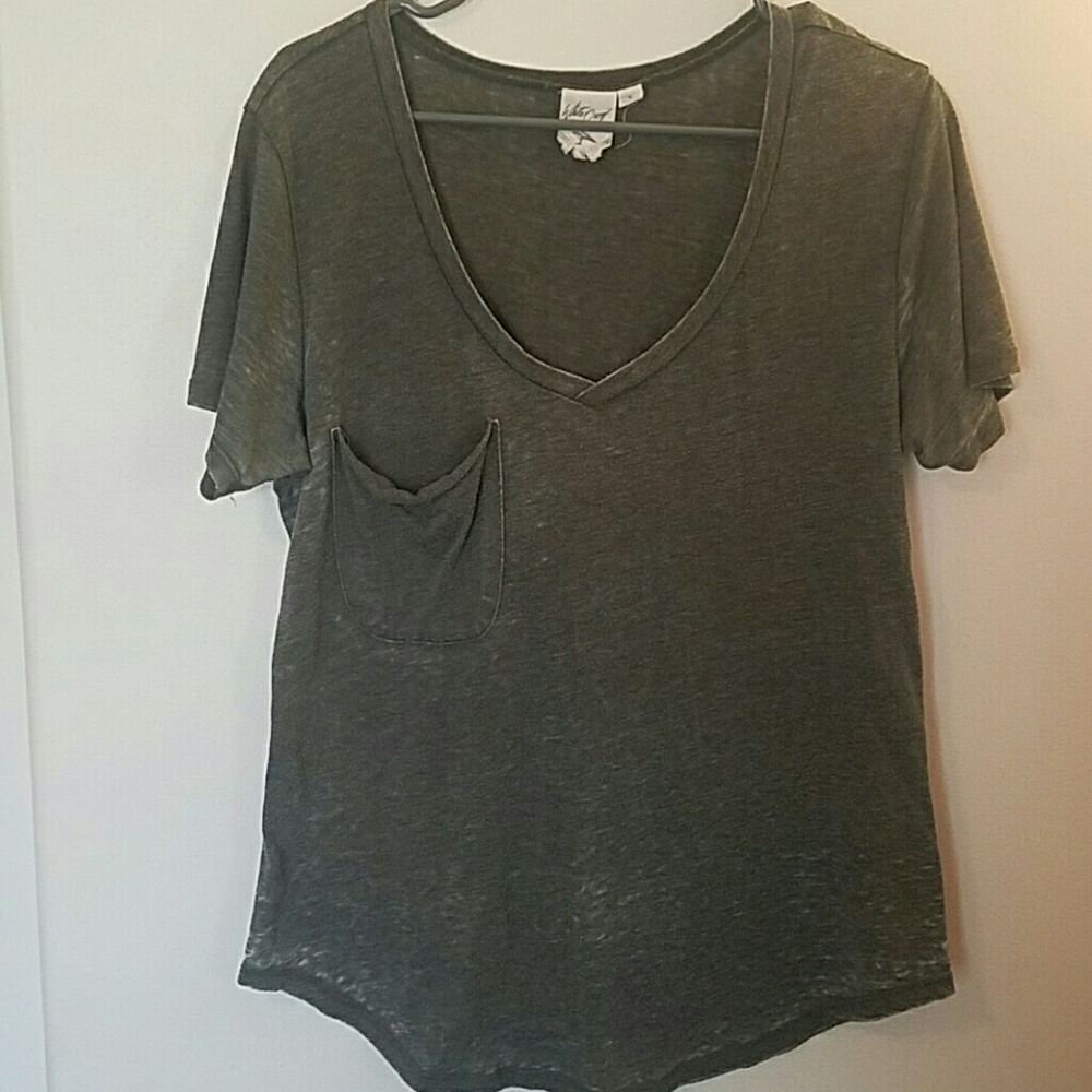 White Crow green tee.